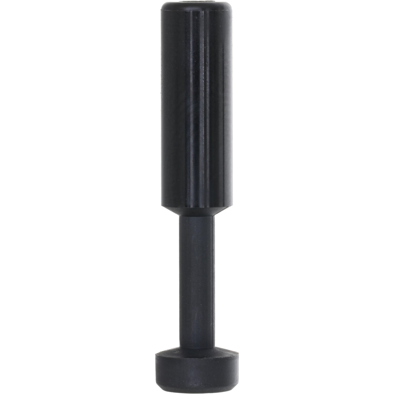 Black plastic blanking plug on white background.