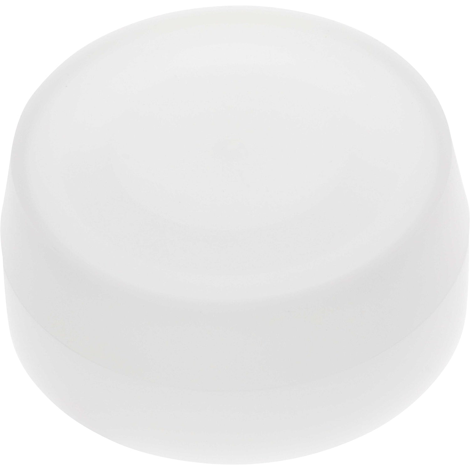 White cylindrical machined part made of Delrin plastic, shaped like a puck on white background