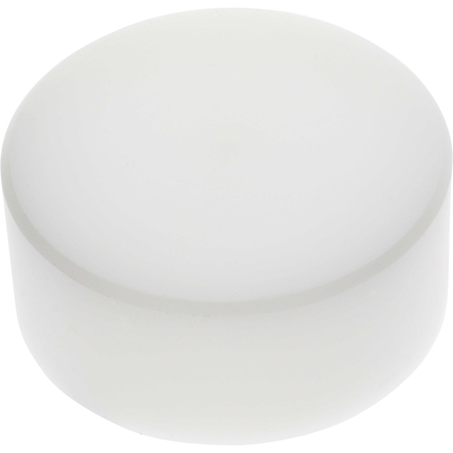 White cylindrical machined part made of Delrin plastic, shaped like a puck on white background