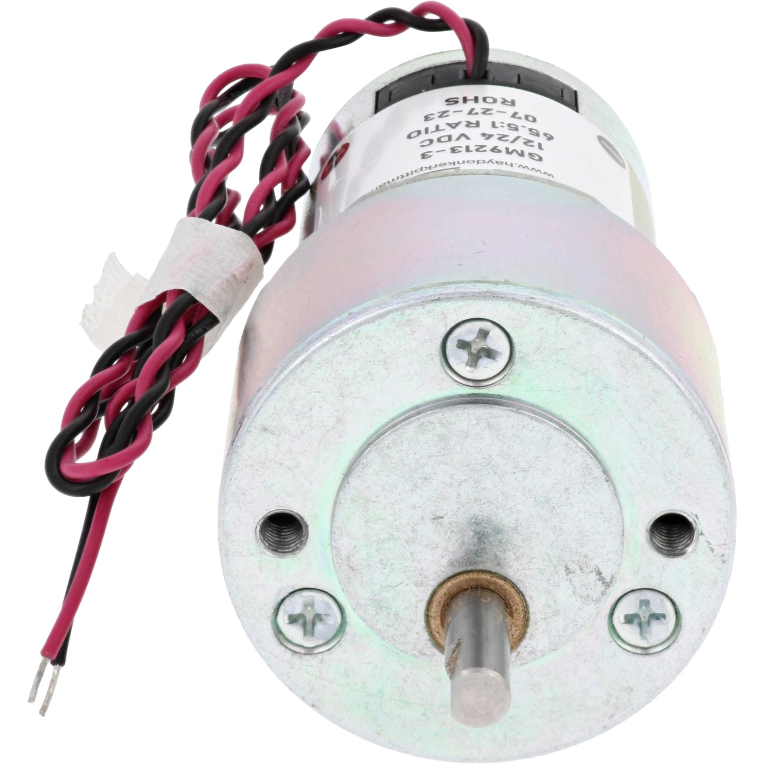 Mini gear motor with red and black wires on white background. 