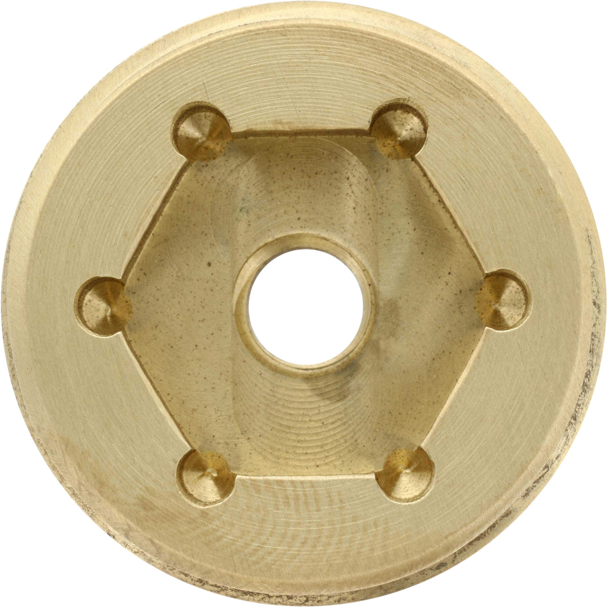 Circular top surface of machined brass on white background. Surface has a hexagonal cut out in the center with a circular threaded through hole cut through the part. FC6B