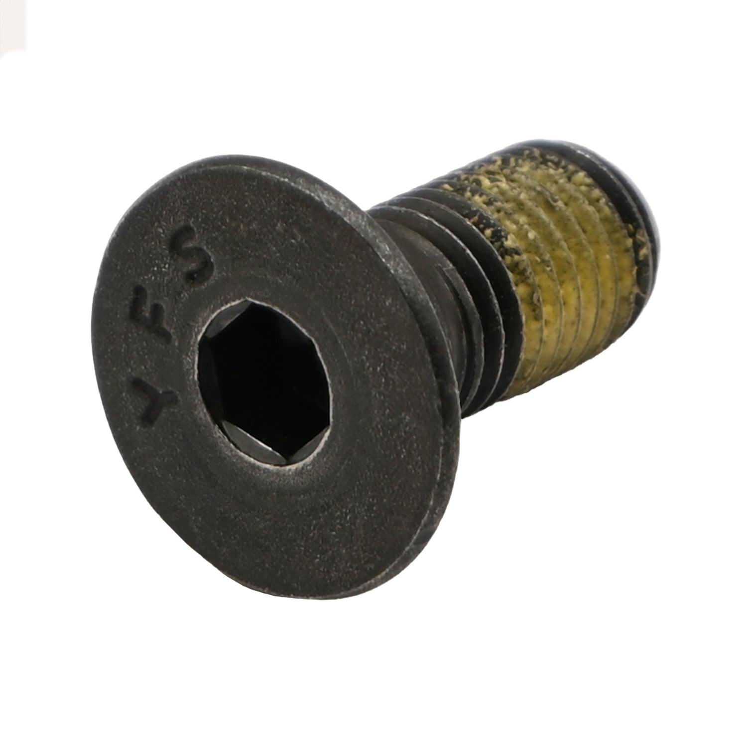 Black alloy steel flat head socket head cap screw with yellow nylon patch on white background.