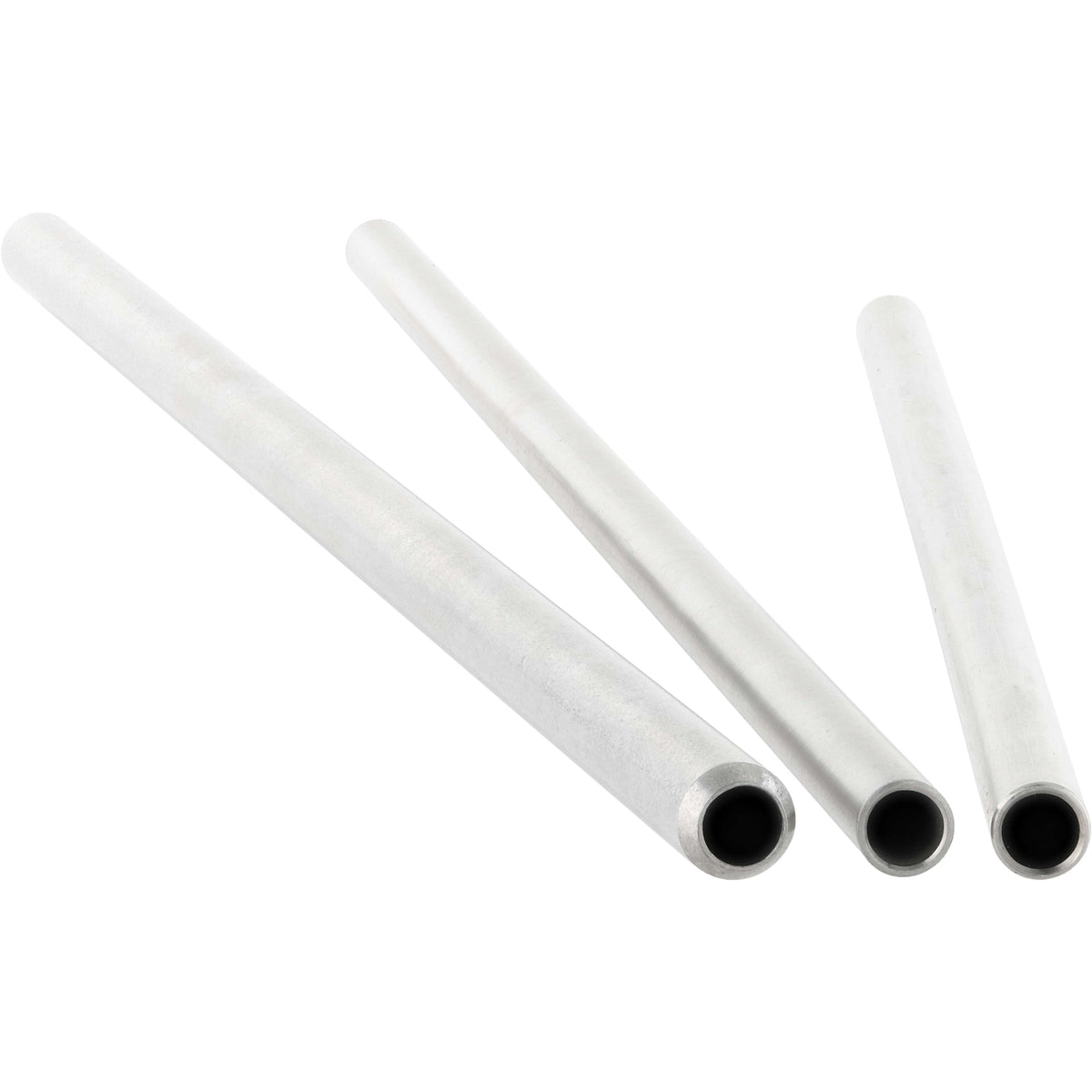 An assortment of three differently sized stainless steel tubes on white background. 