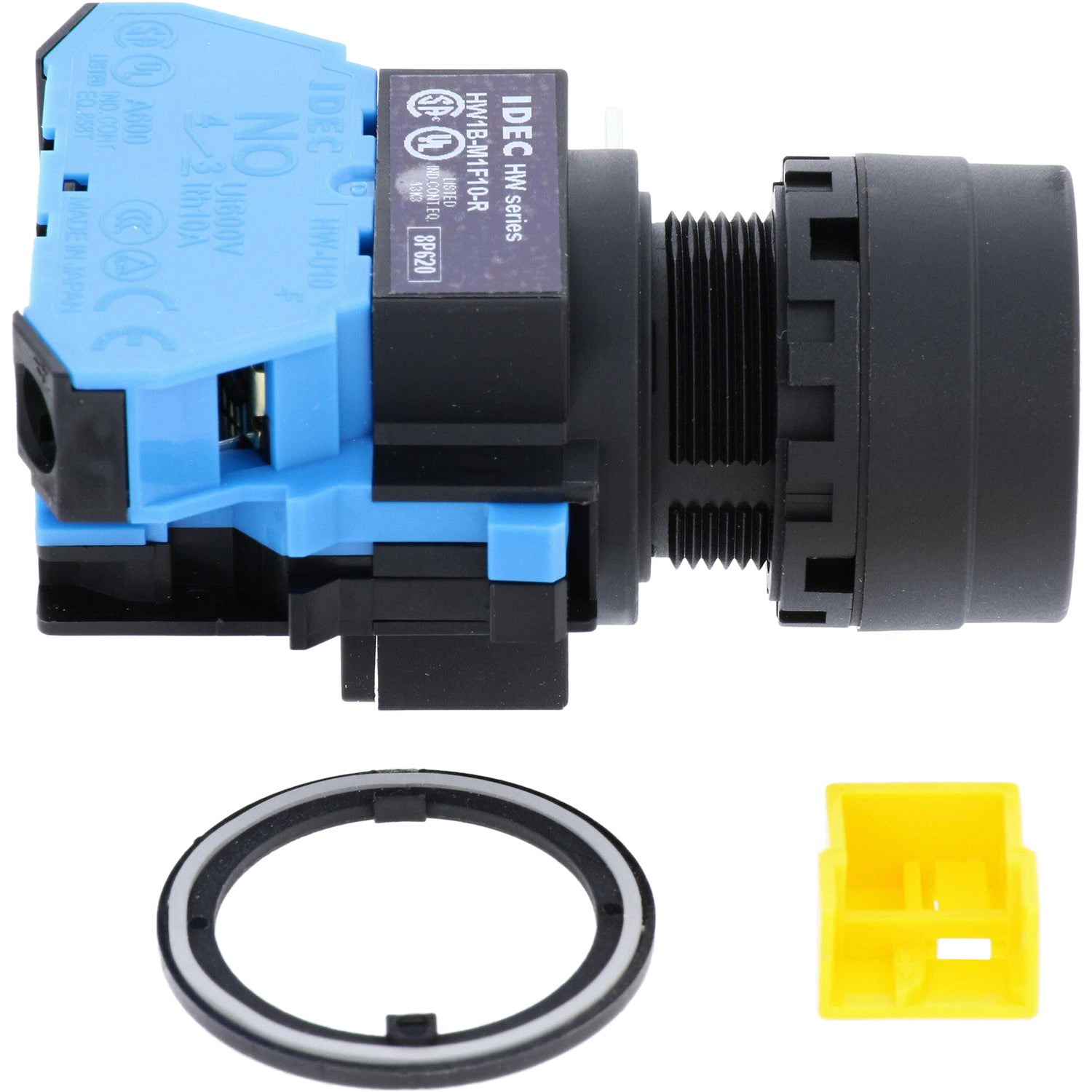 20mm red pushbutton on black and blue housing. Black and white retaining ring and a small, yellow, cube shaped connector cap are shown to the side of the push button. These parts are shown on a white background.