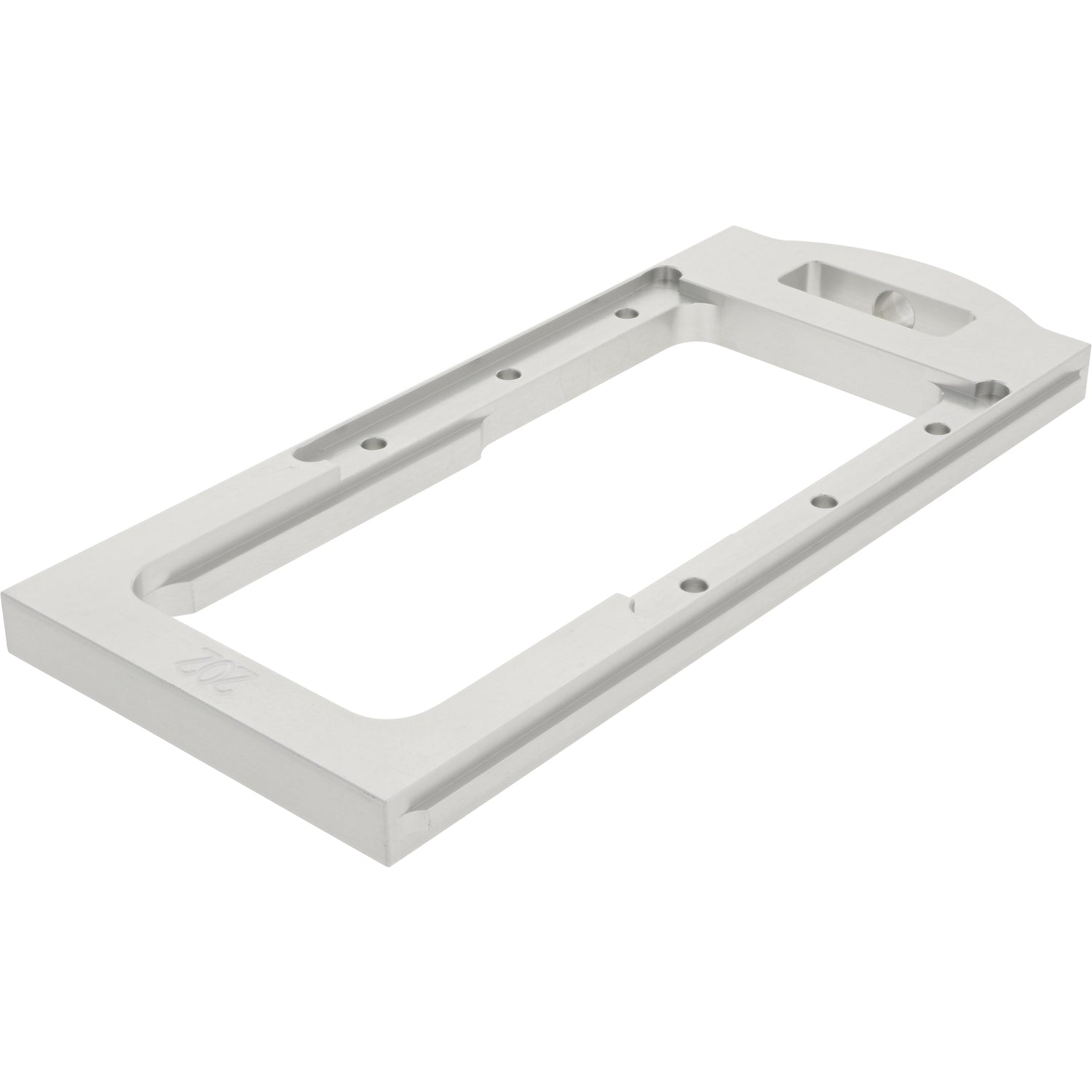 Gray aluminum rectangular part with center cut out and multiple through holes. on a white background.