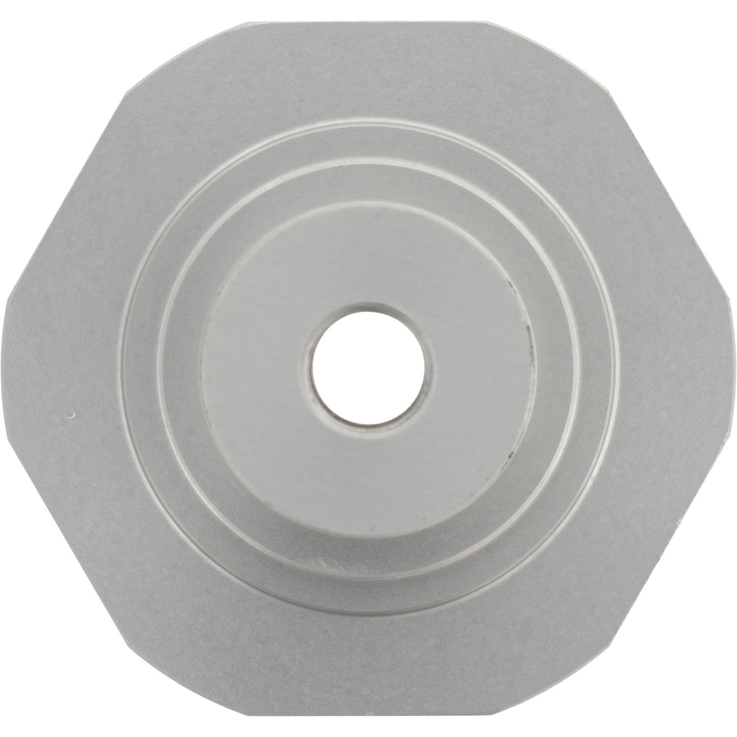 Grey hard anodized aluminum decagonal part with center through hole shown on white background.