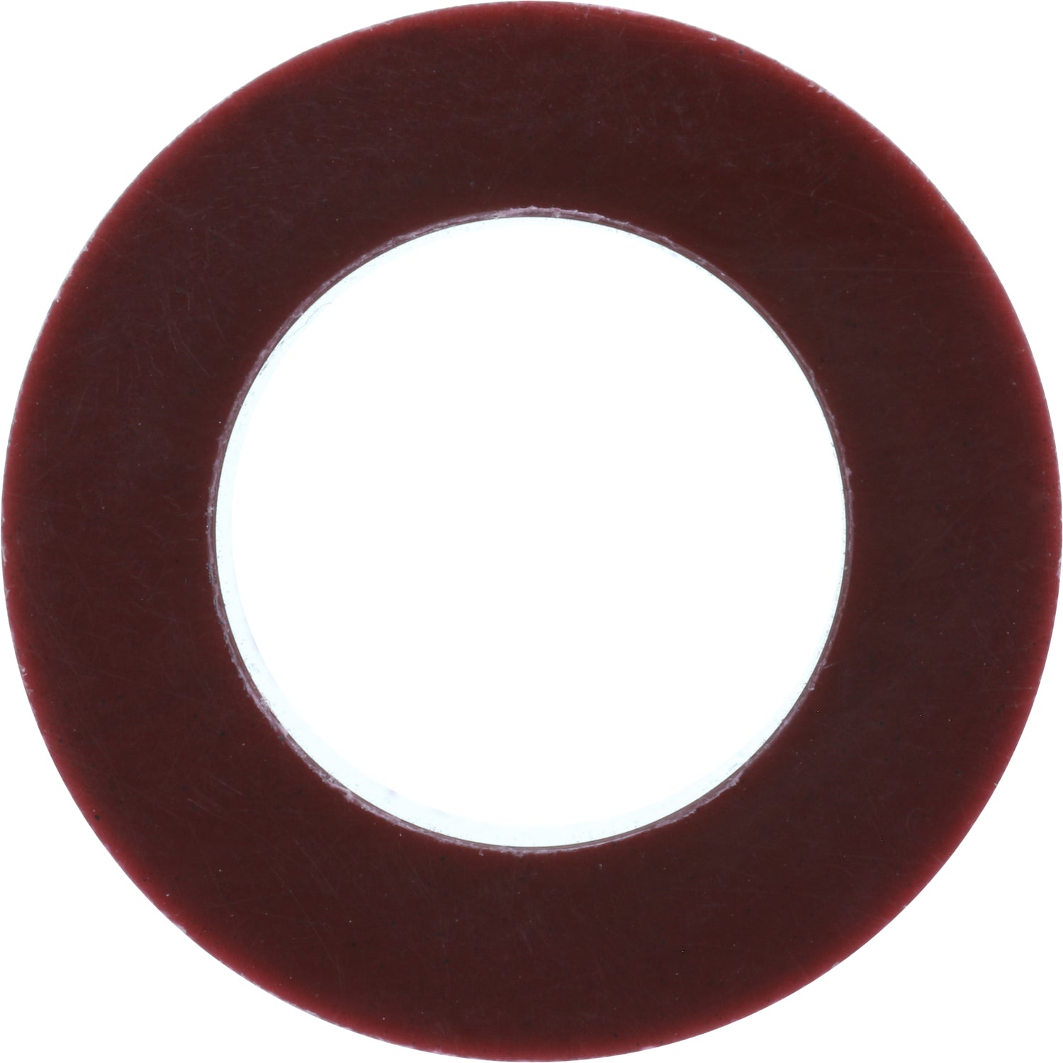 Burgundy colored plastic bushing on white background. 