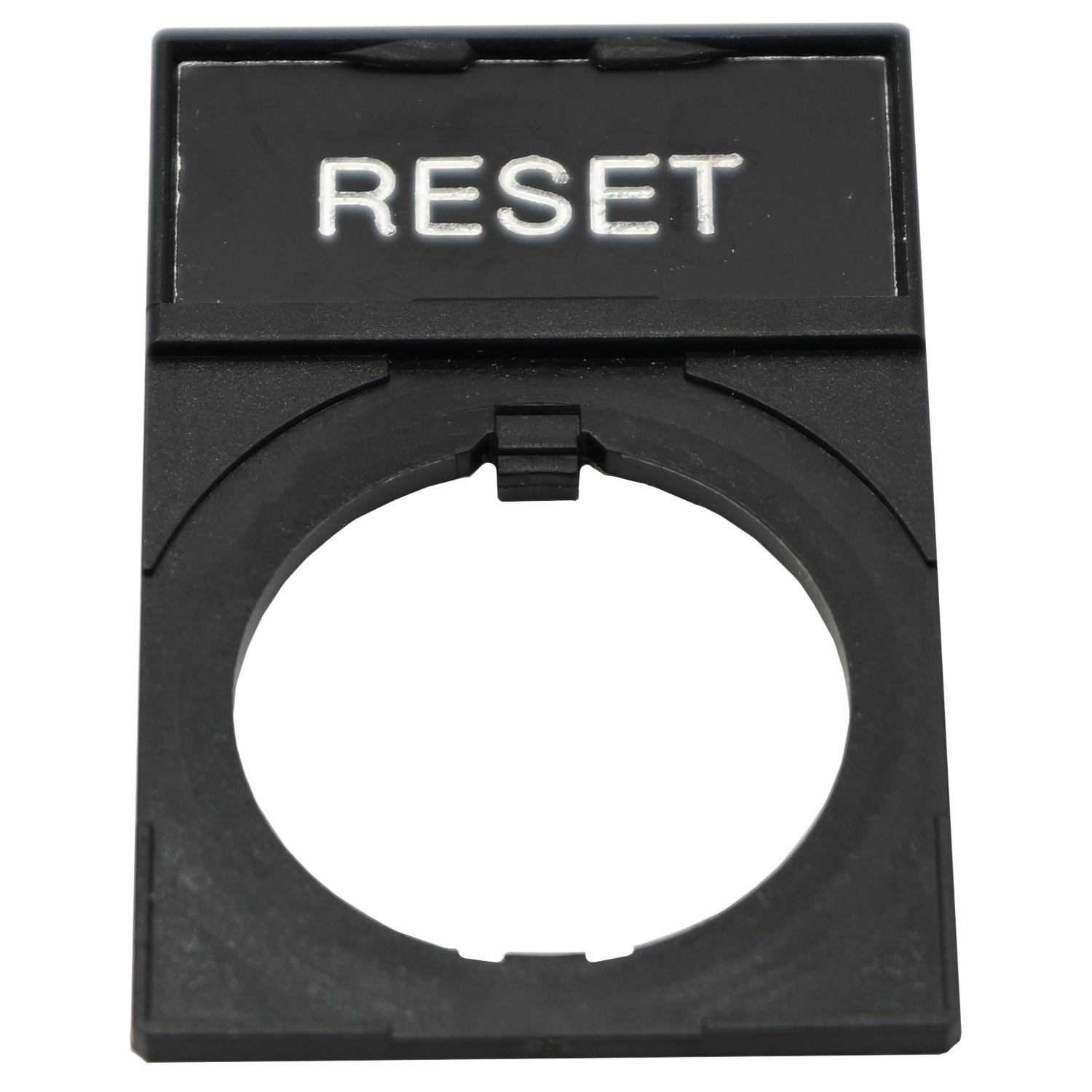 Black rectangular plastic nameplate with white text that reads "RESET". The part has a hole cut into it and is shown on a white background.