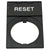 Black rectangular plastic nameplate with white text that reads "RESET". The part has a hole cut into it and is shown on a white background.