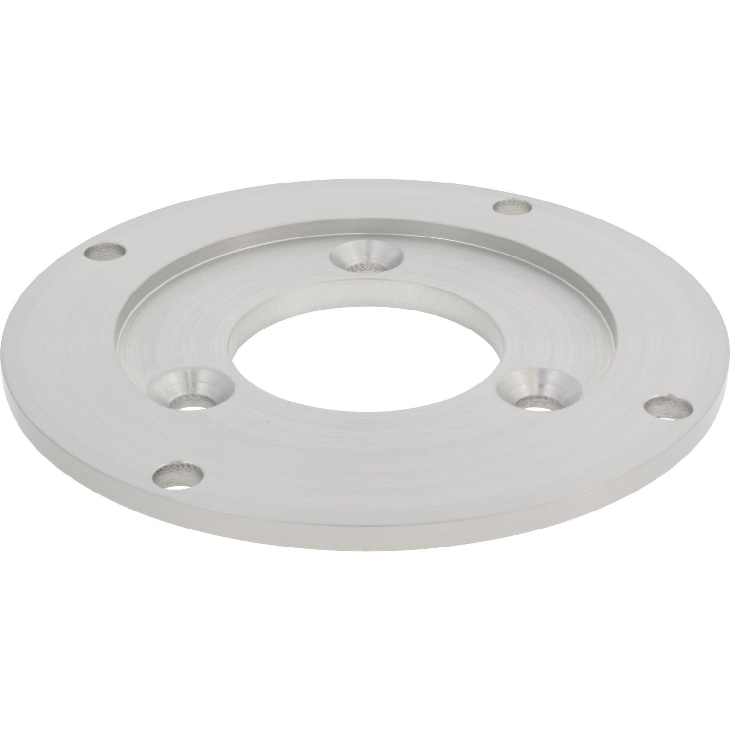 Disk shaped aluminum part with large center hole and multiple smaller mounting holes shown on white surface. 