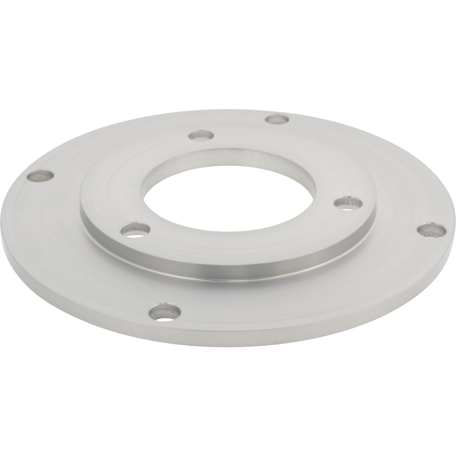 Disk shaped aluminum part with large center hole and multiple smaller mounting holes shown on white surface.