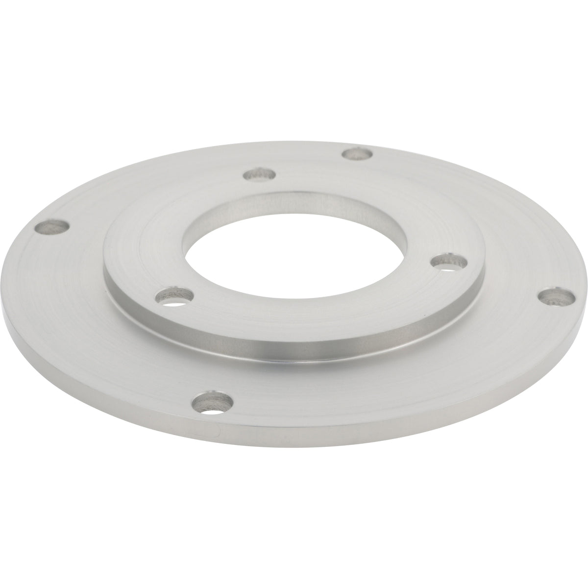 Disk shaped aluminum part with large center hole and multiple smaller mounting holes shown on white surface.