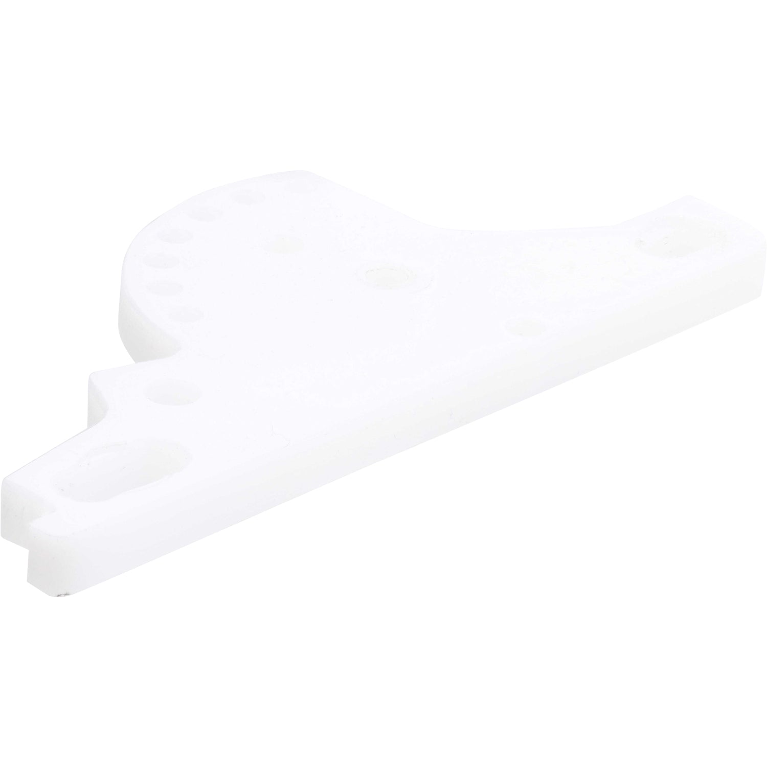 White plastic machined part with multiple holes shown on white background. 