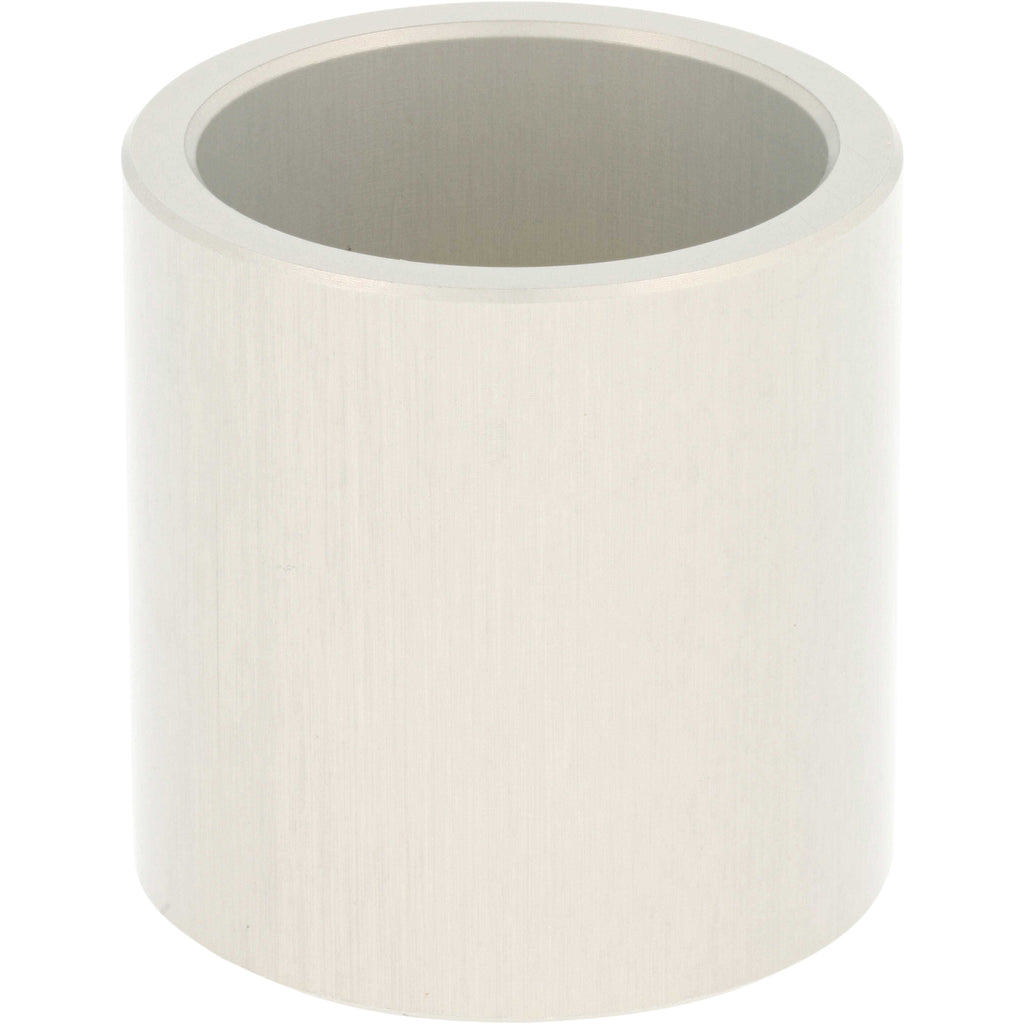Cylindrical hard anodized aluminum part with through hole on white background. 