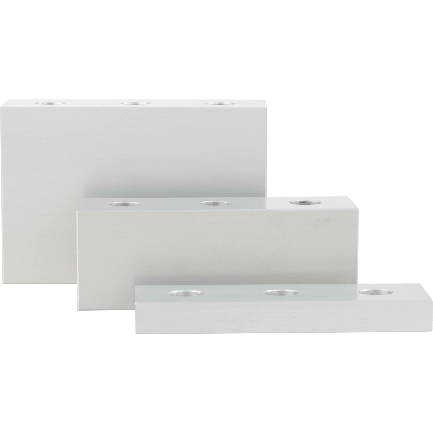 Three differently sized, grey rectangular blocks made of hard anodized aluminum. Each block as three evenly spaced through holes. Parts shown on white background.