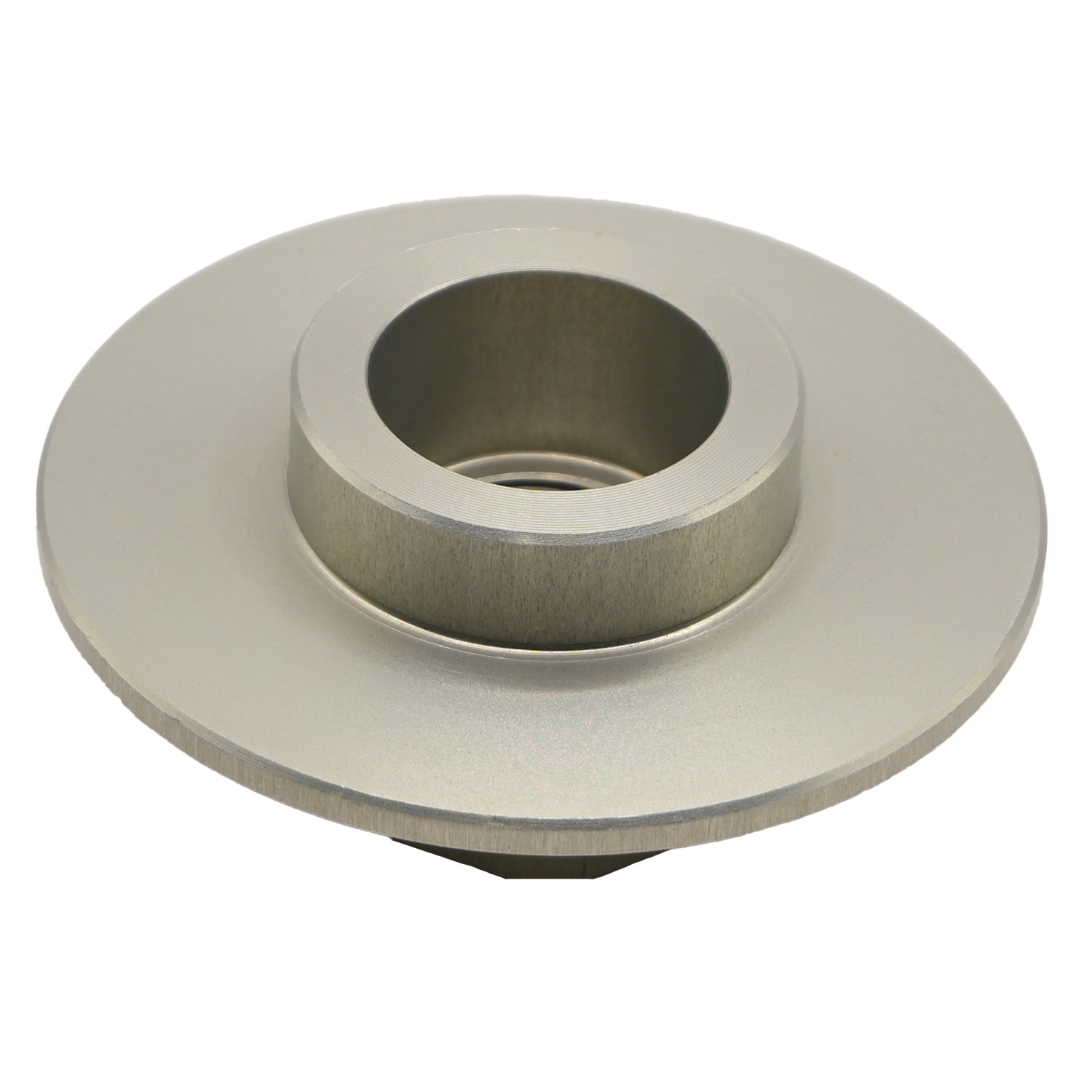 Grey hard anodized aluminum hex nut part with wide flange in middle of part shown on white background. 