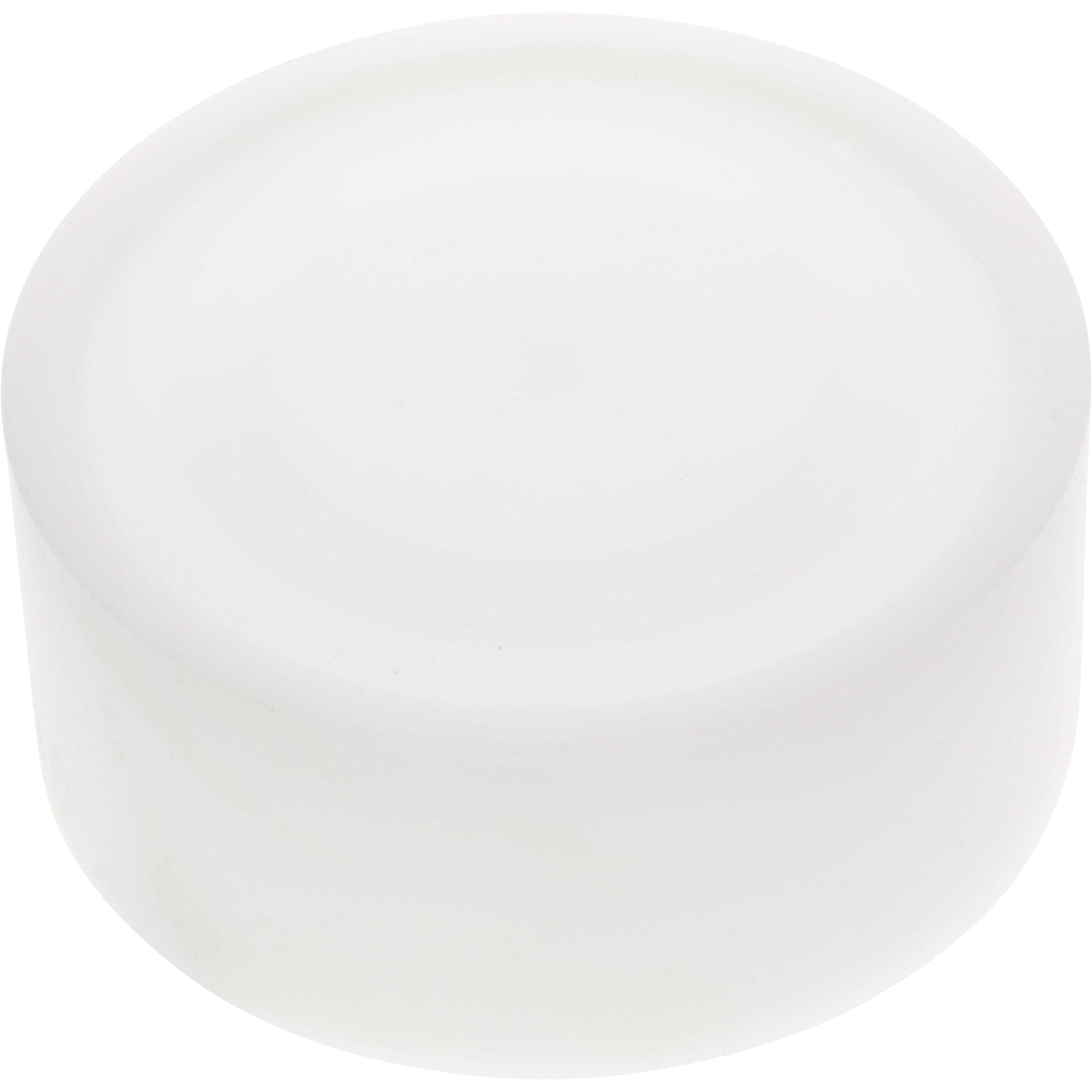 White cylindrical machined part made of Delrin plastic, shaped like a puck on white background
